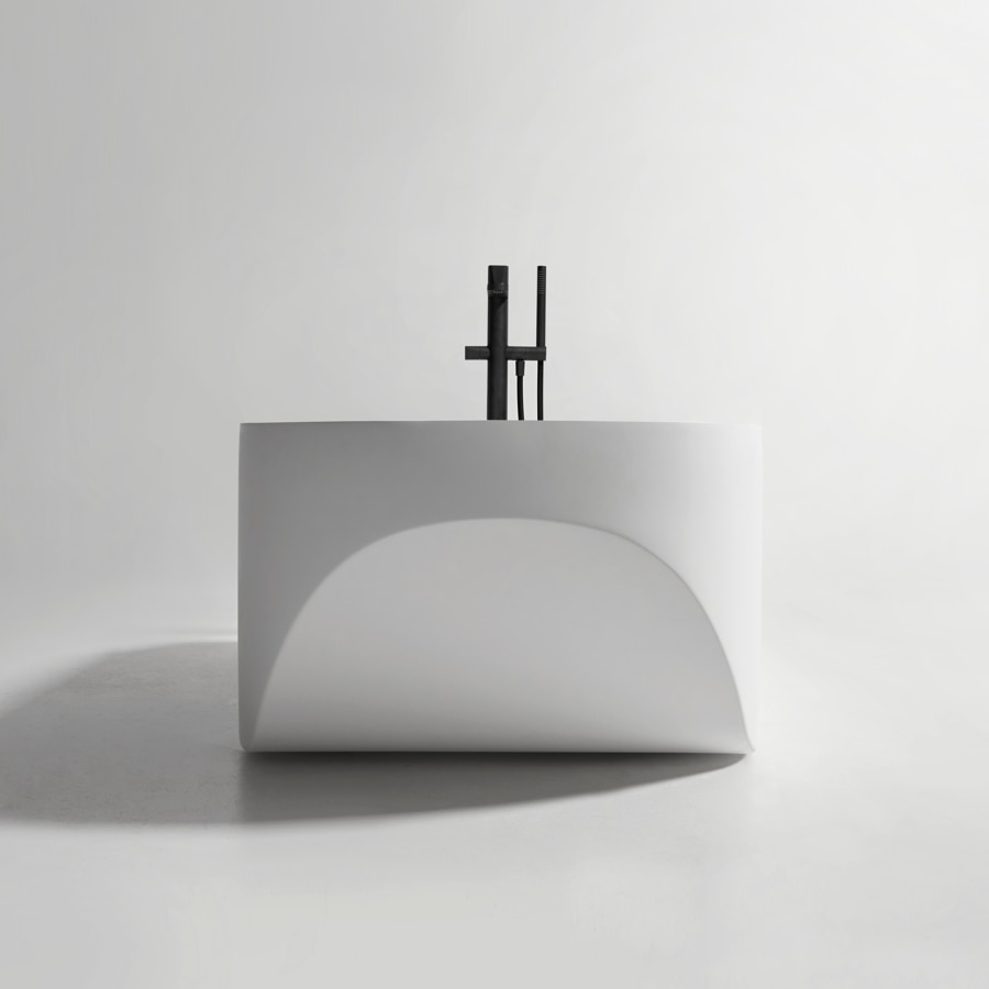 the transformation of a perfect geometry, through two diagonal cuts that dissect the depth of the basin.